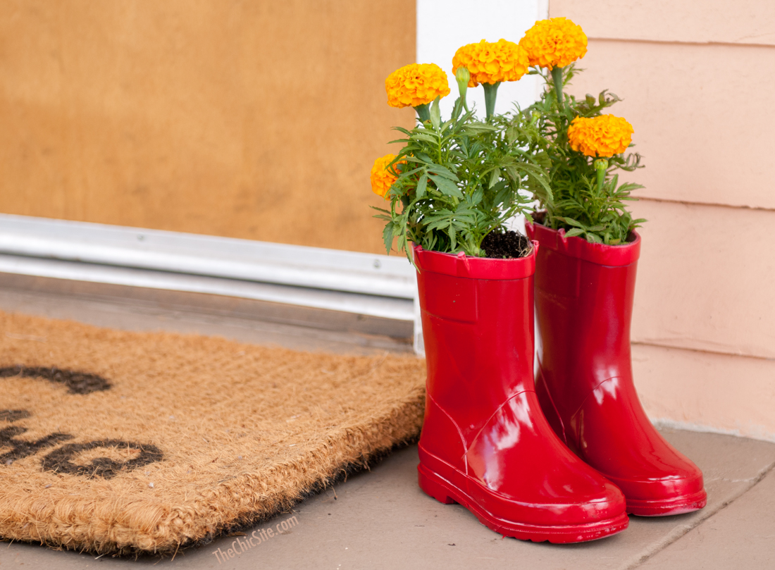 rain boots with flowers in them