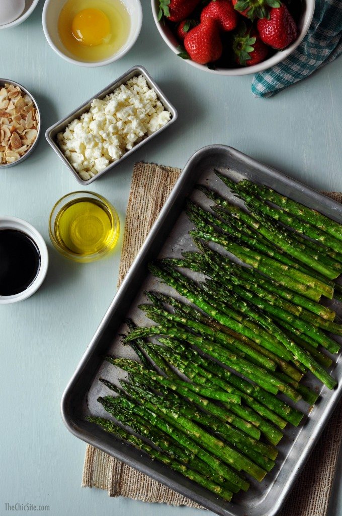 roasted asparagus on a baking sheet