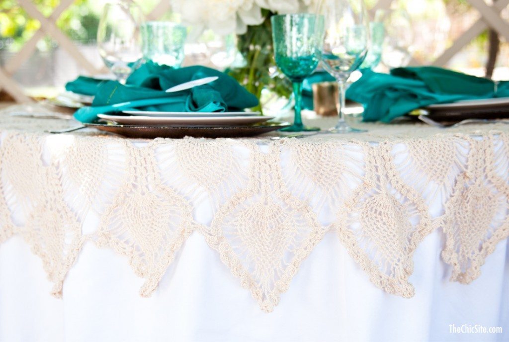 crocheted table cloth on summer table