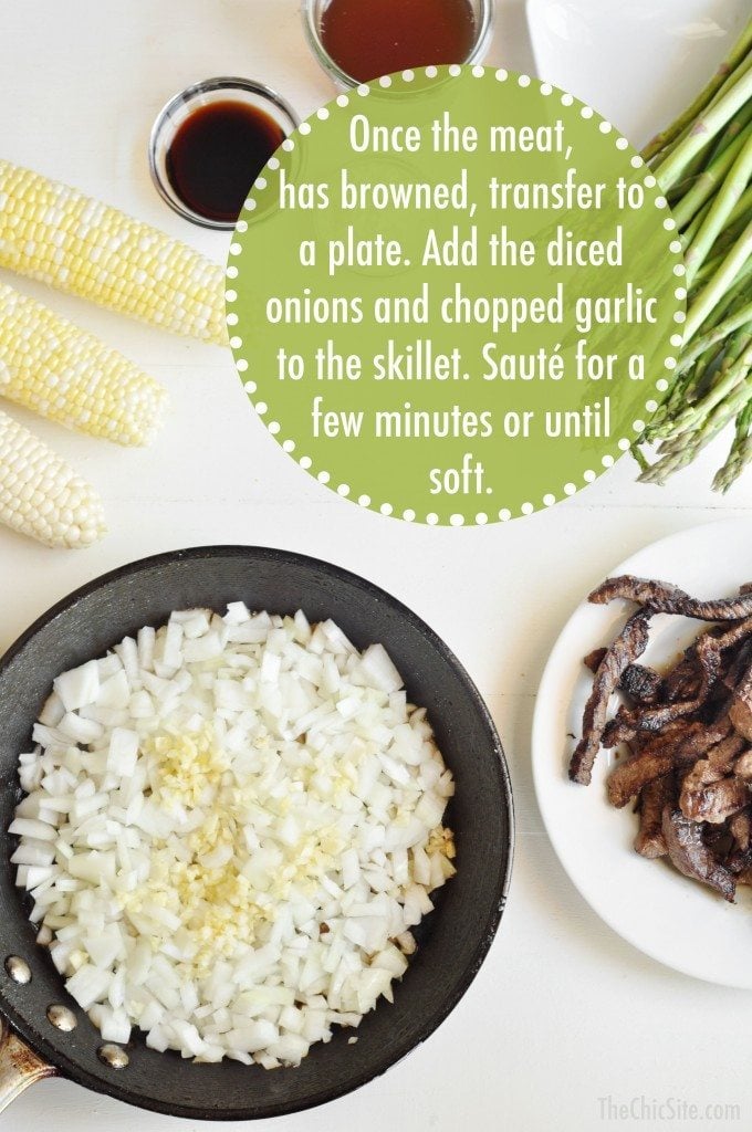 onions and garlic cooking in a skillet