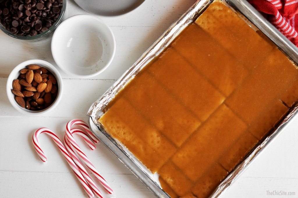 caramel and graham crackers on baking sheet