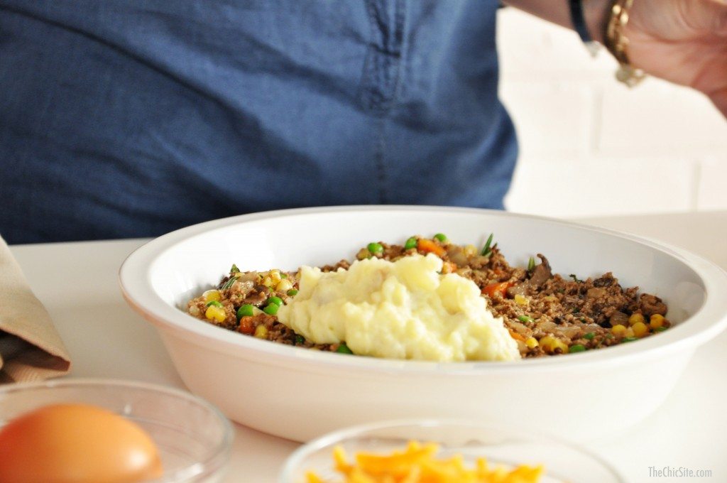 mashed potatoes on top of beef and vegetables
