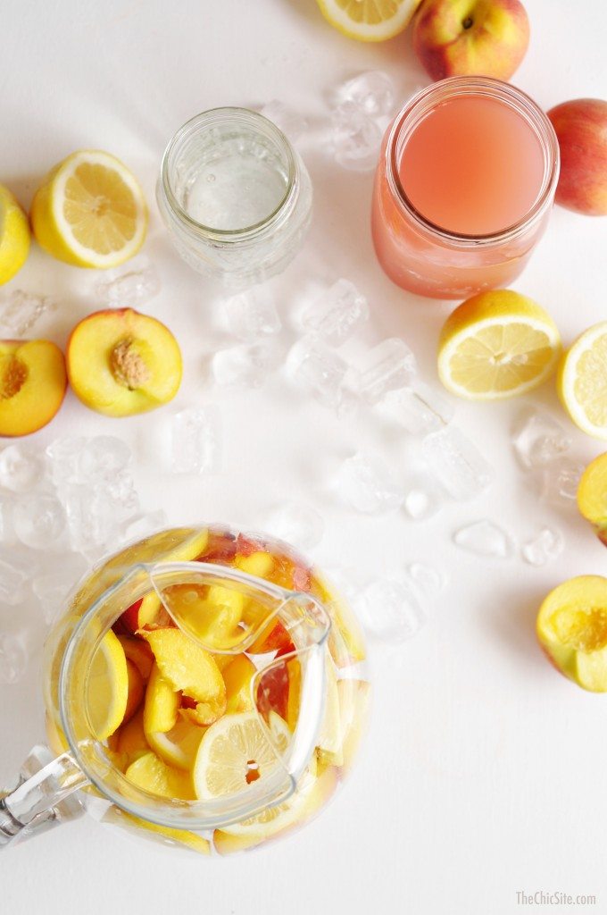 peaches and lemon in pitcher