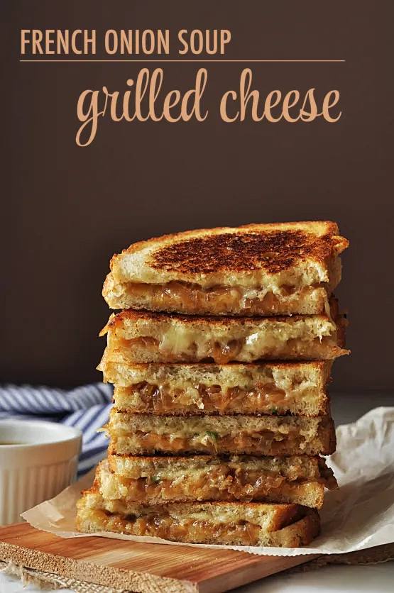 A photo of grilled cheese halves in a stack with "French Onion Grilled Cheese" written at the top