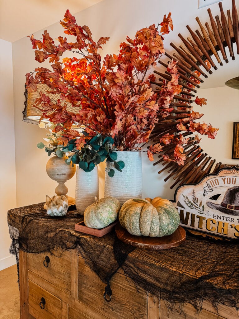 fall leaves in large vase